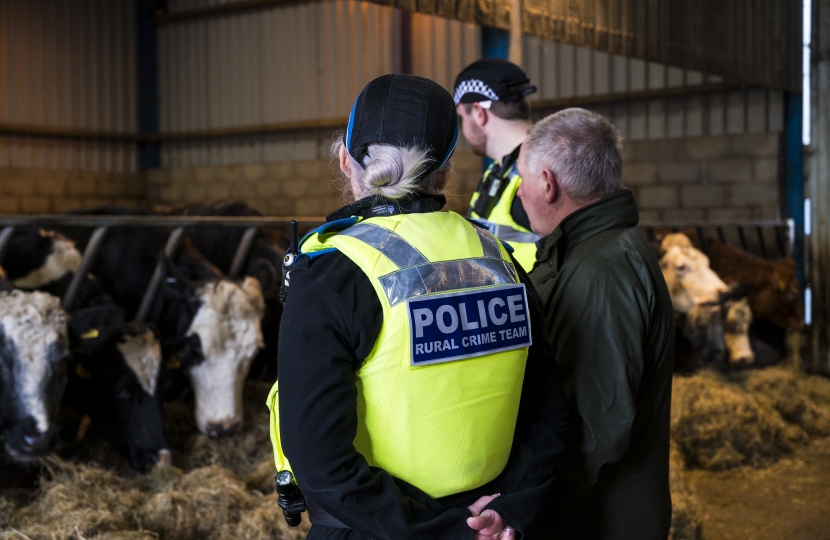 Cheshire Rural Crime Team with livestock in shed