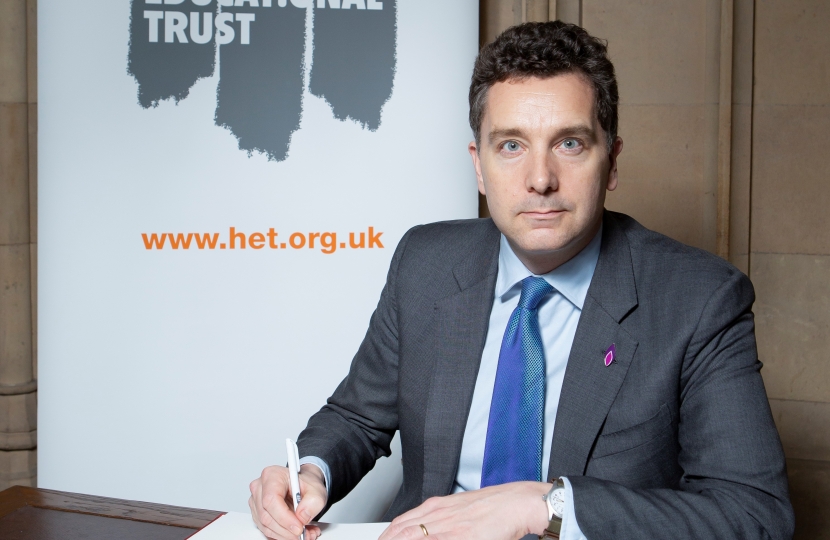 Edward Timpson signing book of commitment 